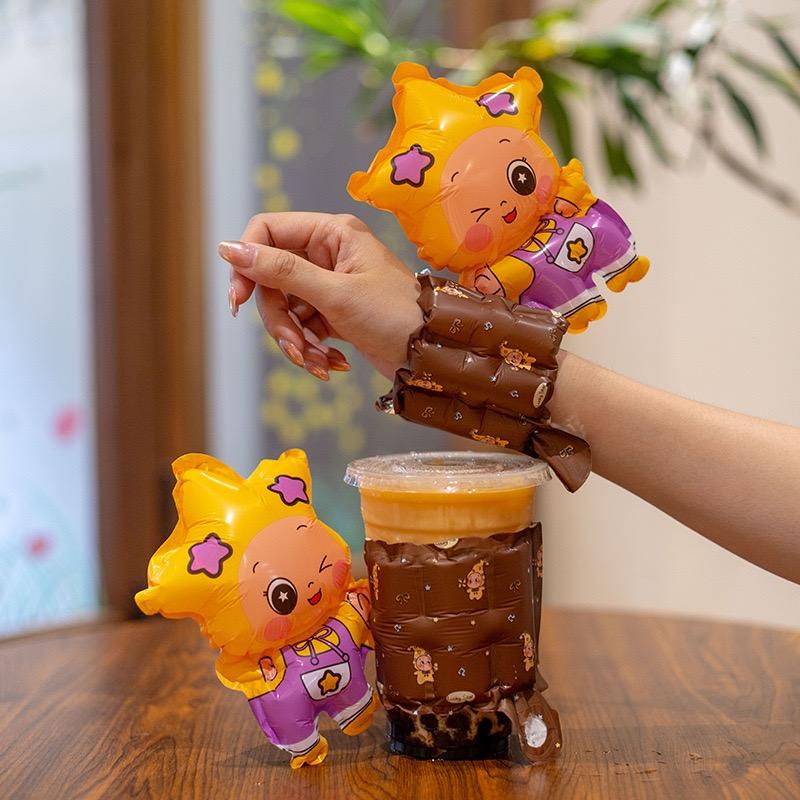 星星人手腕氣球與咖啡色杯套氣球組合.JPG